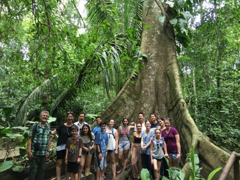 Image: Students and teachers standing in a rainforest in Costa Rica
