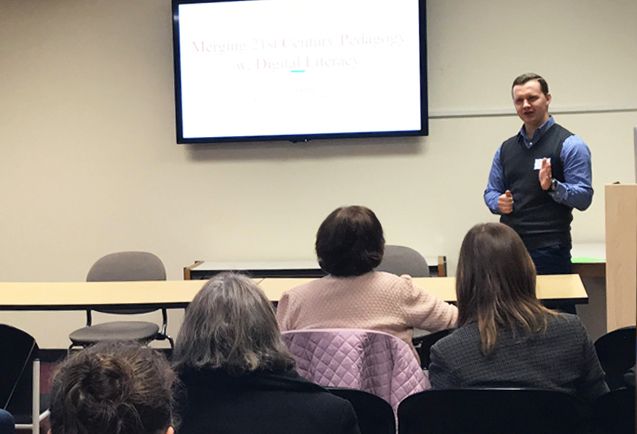 Photo of presenter at lectern at the M.A. TESOL Adult Program's 6th Annual Professional Development Mini-Conference: “Building Communities Through Digital Literacy.”