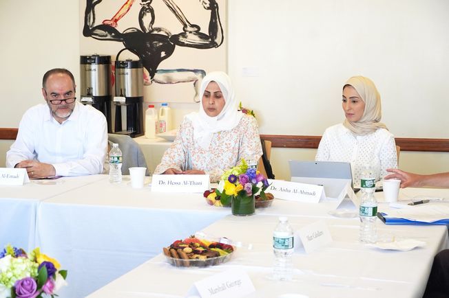 Delegation from Qatar University sitting at table