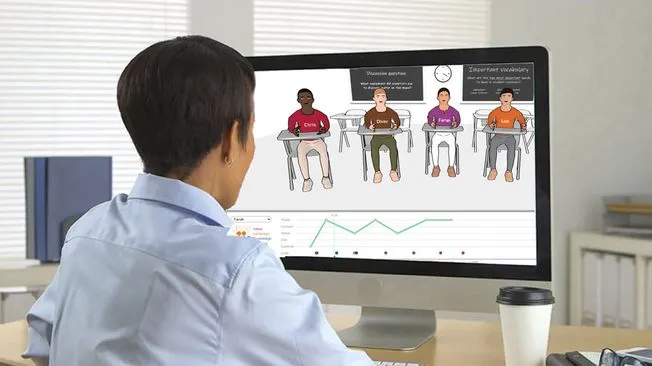 A Student sits in front of a computer using the Teaching With Grace artificial intelligence powered virtual classroom