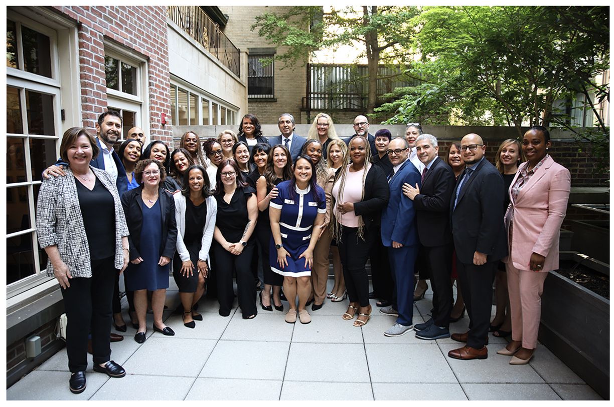 The Gray Fellows 2024 to 2025 "Seal Team 6" cohort gathers on an outdoor patio.
